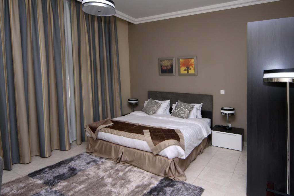 Magnum Hotel & Suites West Bay Doha Phòng bức ảnh